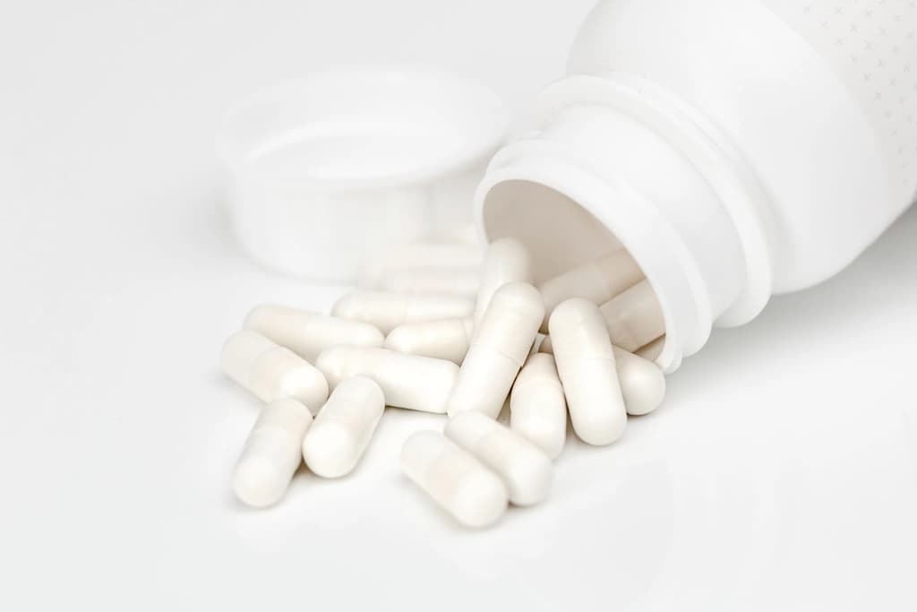 Capsules dispensed from a bottle